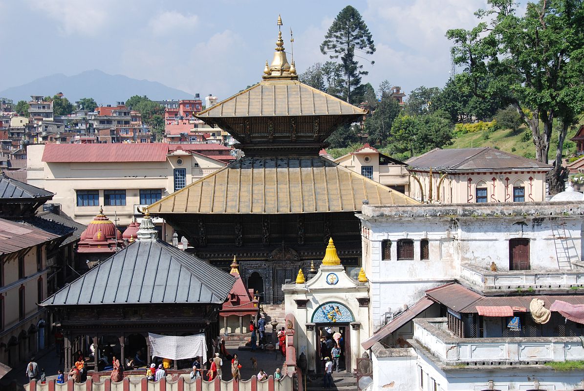 Kathmandu Pashupatinath 14 Pashupatinath Temple From Across River There is a very good view of the Pashupatinath temple complex from across the river on the eastern side. The central two-tiered pagoda dates from 1696.